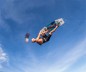 Preview: Duotone Jaime Freestyle TwinTip Board 2021 in der luft beim Kiten