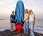 Preview: Starboard iSonic Carbon Reflex Sandwich Board 025 zu dritt am Strand