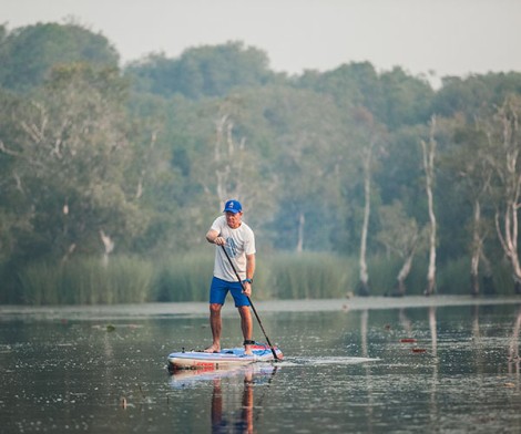 Starboard Sup Air 12.6 x 30" Touring Deluxe SC beim zügigen Paddeln