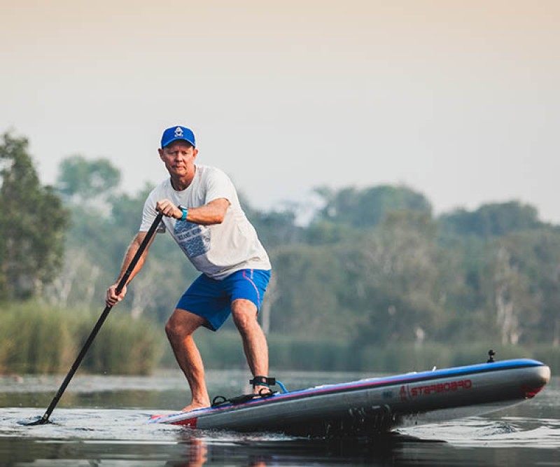 Starboard Sup Air 12.6 x 30" Touring Deluxe SC bei der schnellen Wende